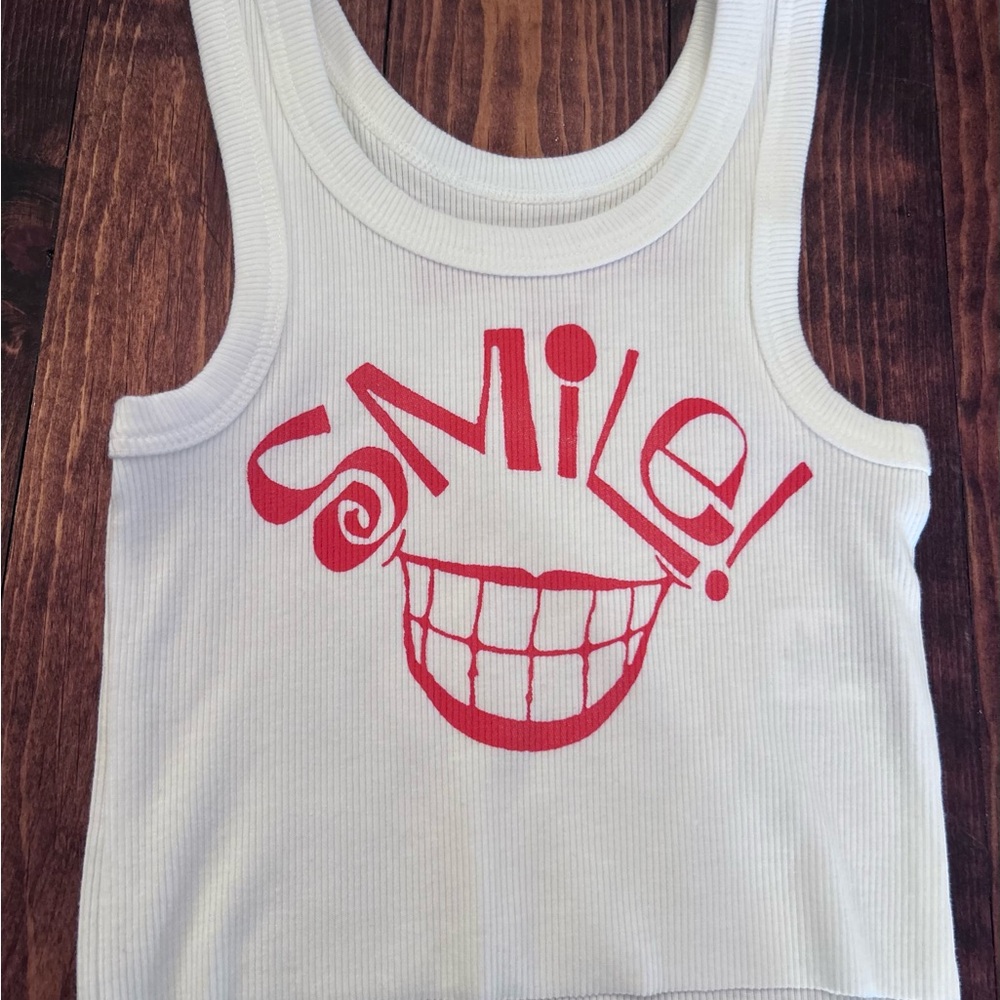 Rowdy Sprout White Tank Top with Red Smile Design